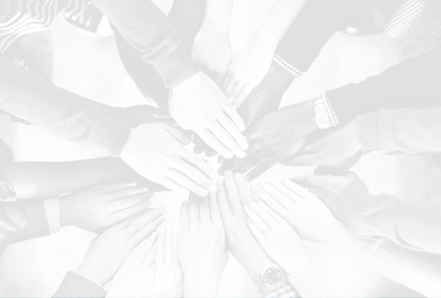 many diverse people placing their hands together in a circle